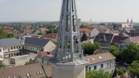 Cityscape-and-beutiful-Church-in-Vác-city,-Hungary-recorded-with-a-DJI-Mavic-2-pro-4K-UHD-30-fps