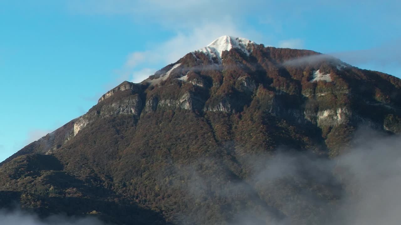 Breathtaking aerial view of the Alps in Italy with snow-capped peaks