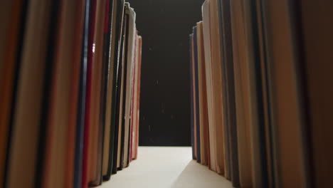 bookshelf with light shining through