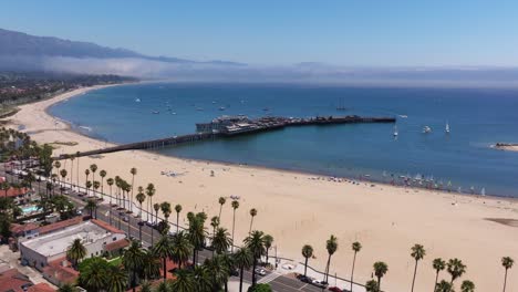 Amazing-Aerial-View-Above-Santa-Barbara,-California,-Famous-Stearns-Wharf-Pier