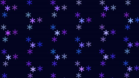 patrón simétrico de copos de nieve púrpura y azul sobre un fondo negro