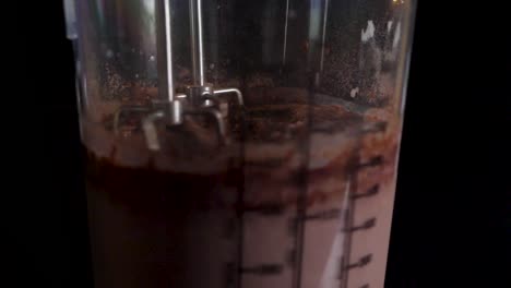 slow motion shot of miking a cacao cream in slow motion