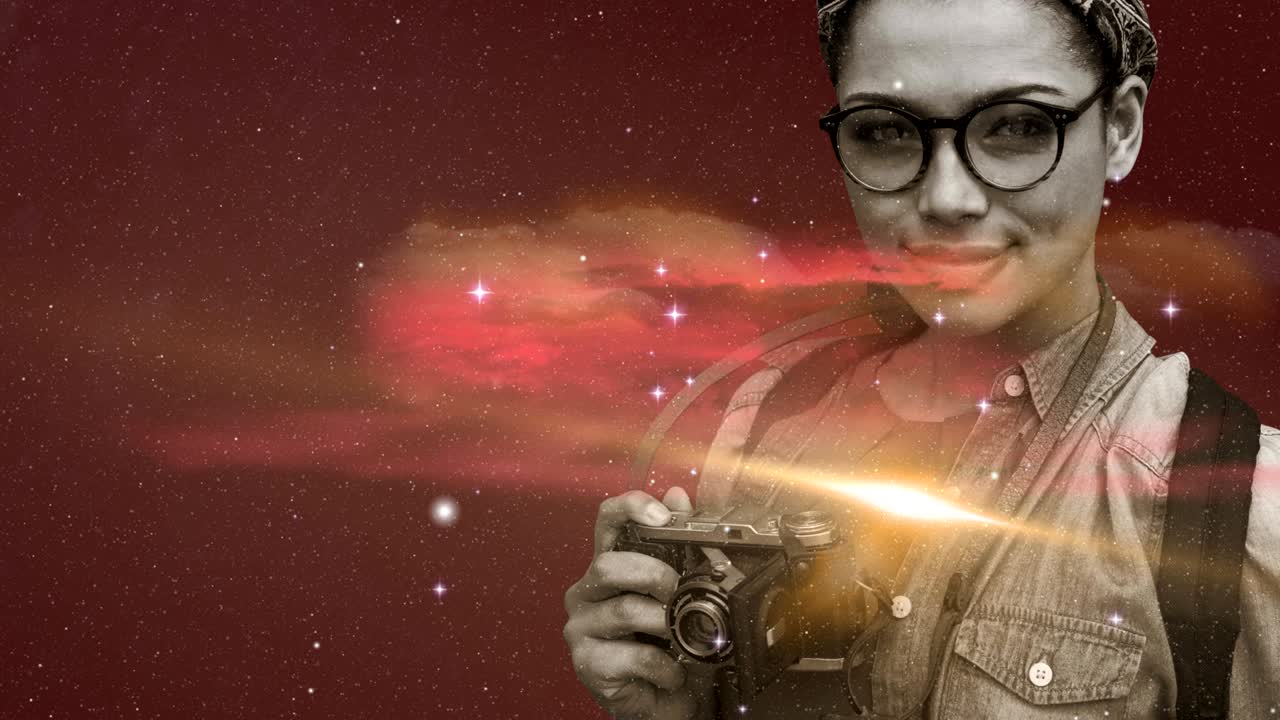 Woman holding digital camera against space in background