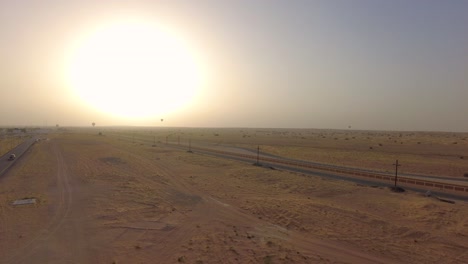 sunrise over sandy sahara desert - uae