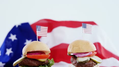 hamburgers on wooden board with 4th july theme