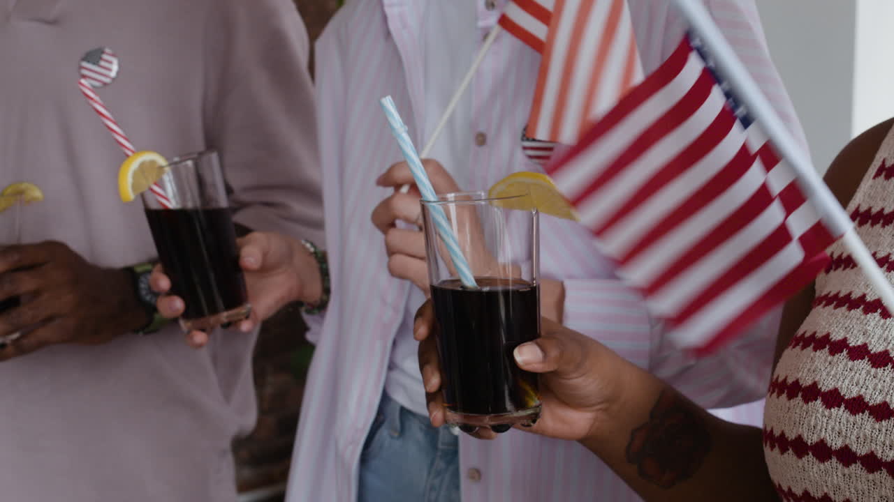 Friends Enjoying Drinks at a 4th of July Gathering
