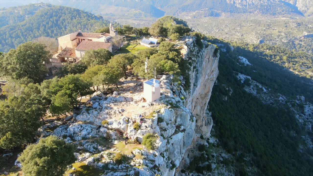 Explore the stunning landscape from Castell de Alaro, a historic fortress in Mallorca. Enjoy breathtaking views of the Tramontana mountains and the serene surrounding nature.