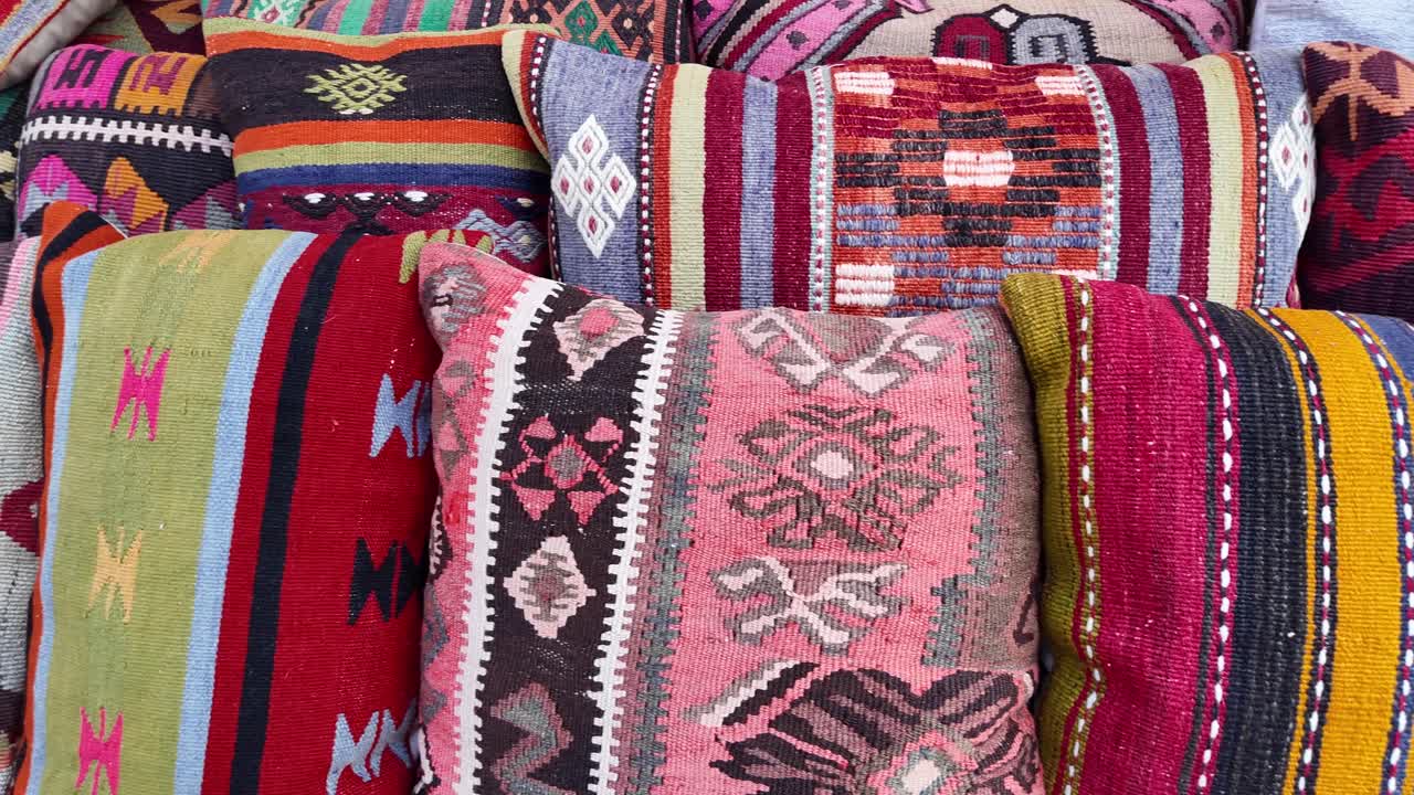 Pile of colorful ethnic pillows