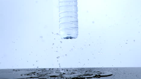 plastic bottle falling in super slow motion