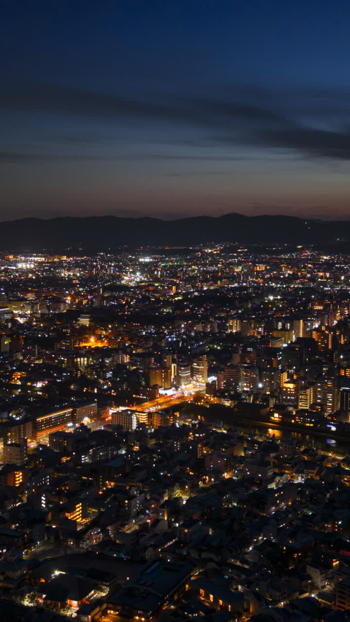 Aerial drone view of Kyoto, Japan in the evening time lapse