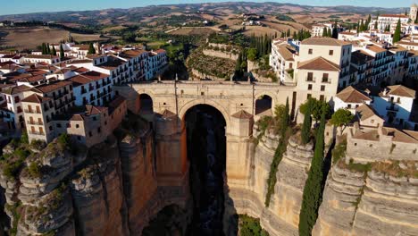 aerial view of a spanish town with a bridge over a canyon