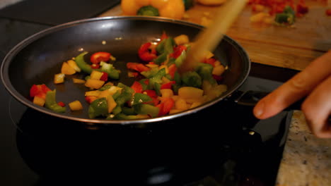 Woman cooking vegetables