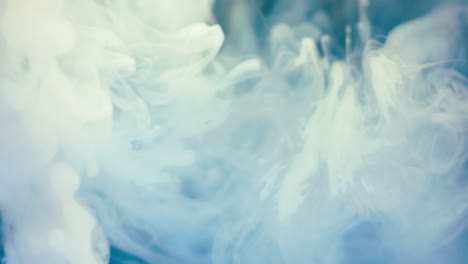 Abstract-movement-of-blue-and-white-smoke,-steam-with-light-falling-on-it