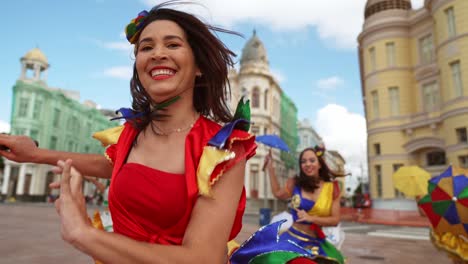 frevo dancers at the street carnival in recife, pernambuco, brazil.