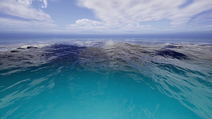 Onde tranquille di un oceano turchese sotto un cielo calmo a mezzogiorno