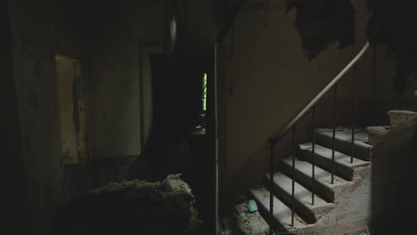 stairs inside abandoned old house in italy