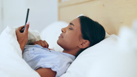 Woman,-bed-and-phone-with-shock