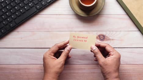 writing password on a sticky note ,