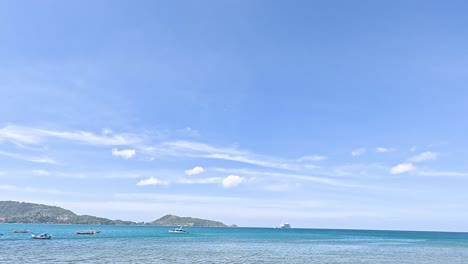a tranquil seaside scene with rocky shores and calm blue waters under a clear sky, captured in port campbell, australia
