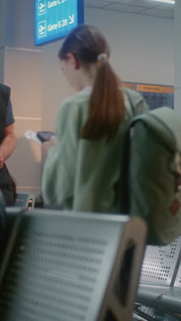 elderly man waiting at airport