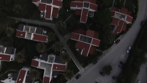 Aerial-view-of-resort-with-cottages-on-the-sea-shore-Trikorfo-Beach-Greece