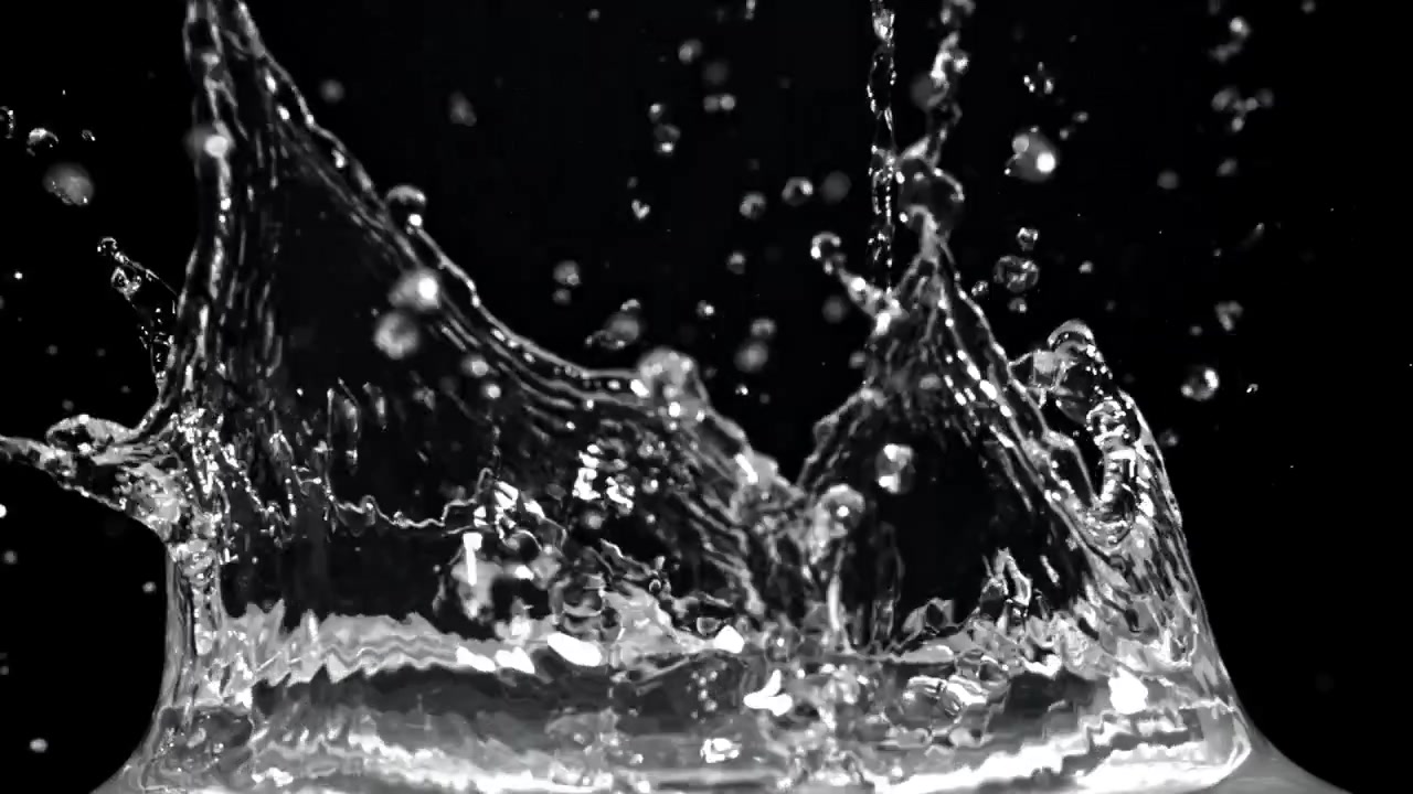 Clear Water Splashing and Pouring in Slow Motion
