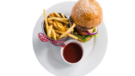 animación de hamburguesa y papas fritas sobre fondo blanco