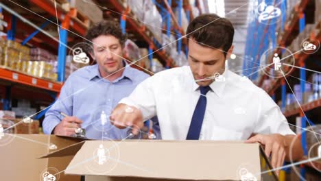 animation of network of connections with icons over caucasian male workers in warehouse