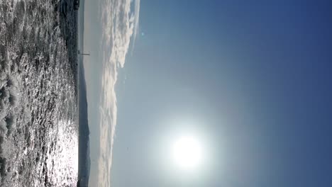 bright sun reflecting on sparkling water