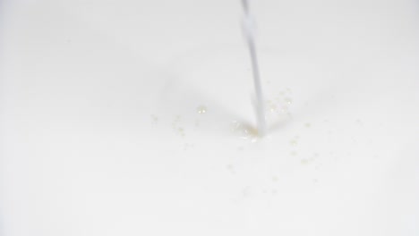 pouring fresh milk in super slow motion 4k