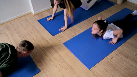 people practising yoga