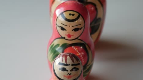close-up of traditional russian matryoshka dolls, stacked one inside the other