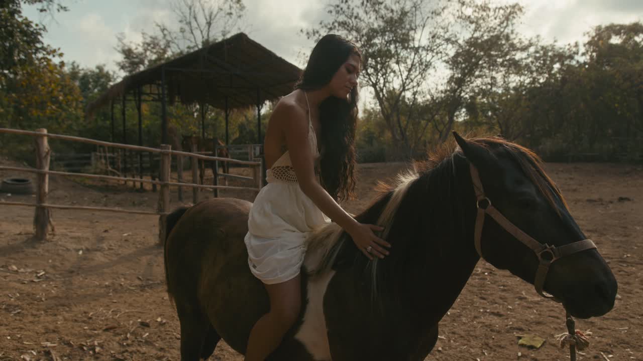 Woman on a horse in a rural setting