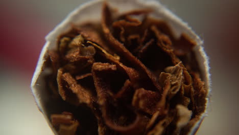 Macro-golden-brown-American-tobacco-Cigarette-moving-around