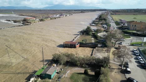 Drone-shot-of-the-aftermath-of-storm-Ciaran-hit-Marina-di-Pisa-harbour-Tuscany,-Italy