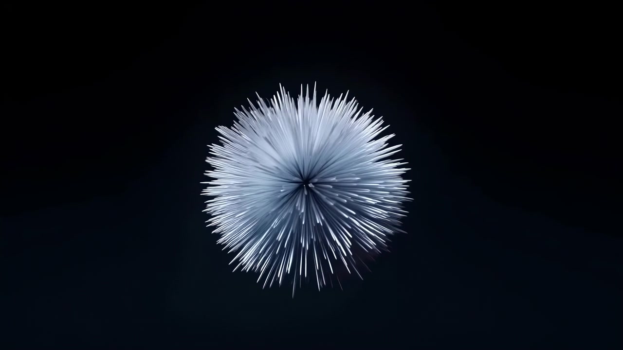 Sottili filamenti luminosi si irradiano da un punto centrale scuro mentre la forma arrotondata e appuntita cambia delicatamente orientamento e densità, rimanendo isolata in una composizione nera minimale.