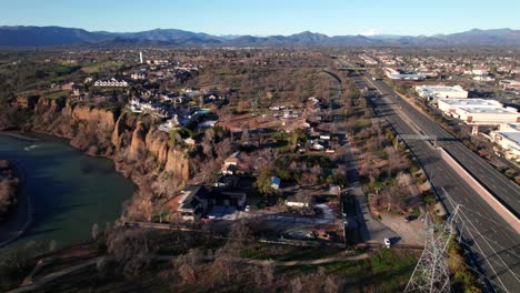 redding, california with sacramento river, highways, mountains in the distance