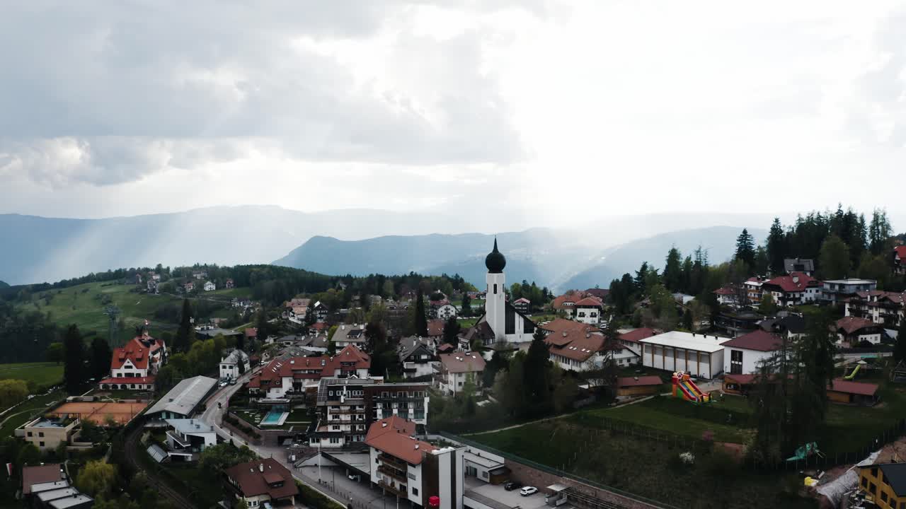 Aerial view of Oberbozen's quaint town in rural Italy