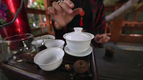 woman enjoying a traditional tea ceremony