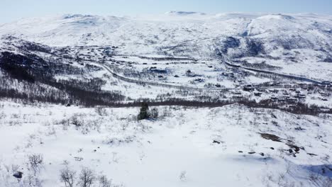 tverrlia maurset at norway national park hardangervidda - aerial overview at popular destination for vacation homes