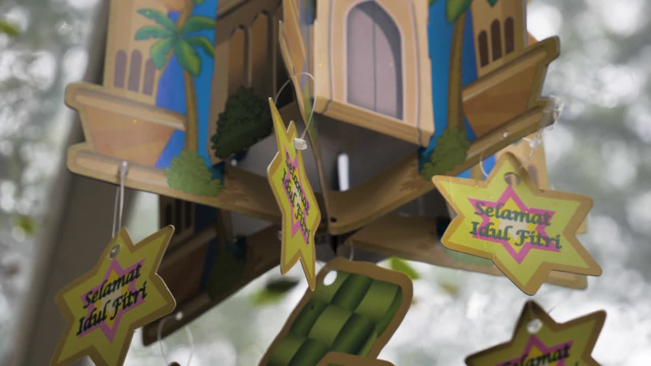 Slow Motion shot of &amp;quot;Happy Eid Al-Fitr&amp;quot; Decoration