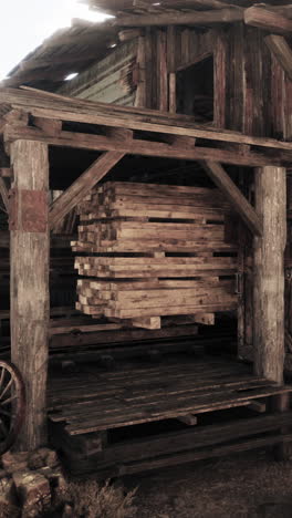 stacked lumber in an old wooden shed