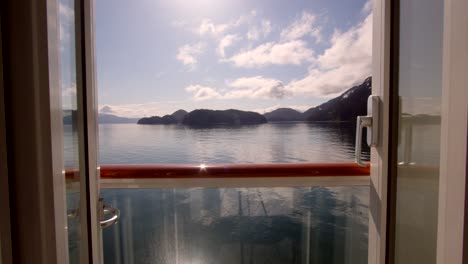 Alaska-Outer-Coast,-Glacier-Bay-National-Park,-Shot-from-cruise-ship-cabin-showing-balcony-and-doors-open
