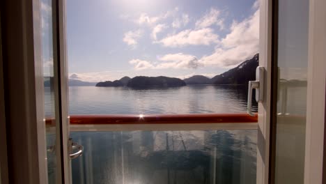 alaska outer coast, glacier bay national park, shot from cruise ship cabin showing balcony and doors open