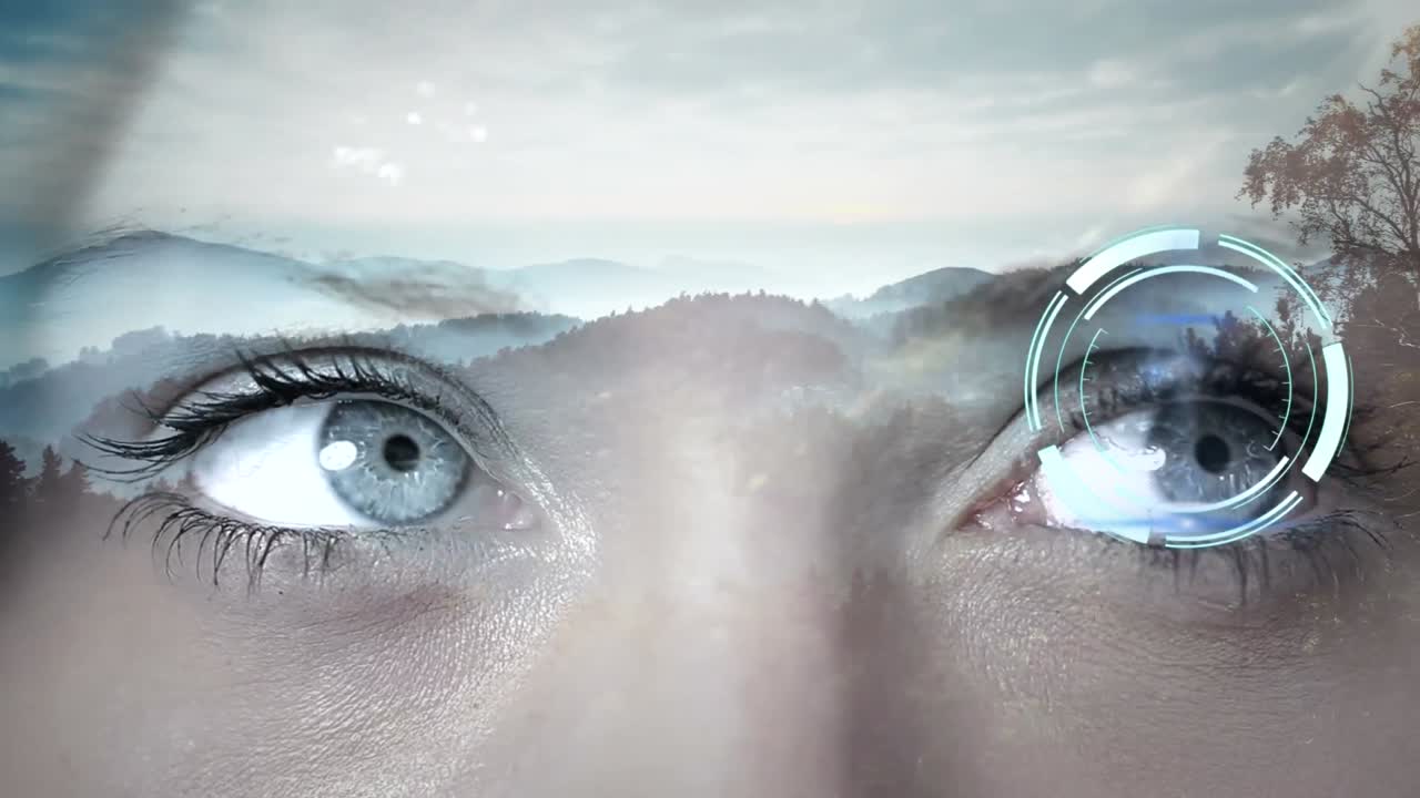 Animation of woman's eyes and clock over mountains