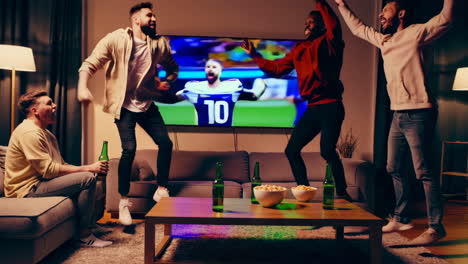 friends watching football game at home