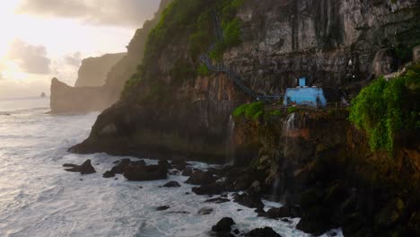 establishing shot of majestic cliff beside coastline of