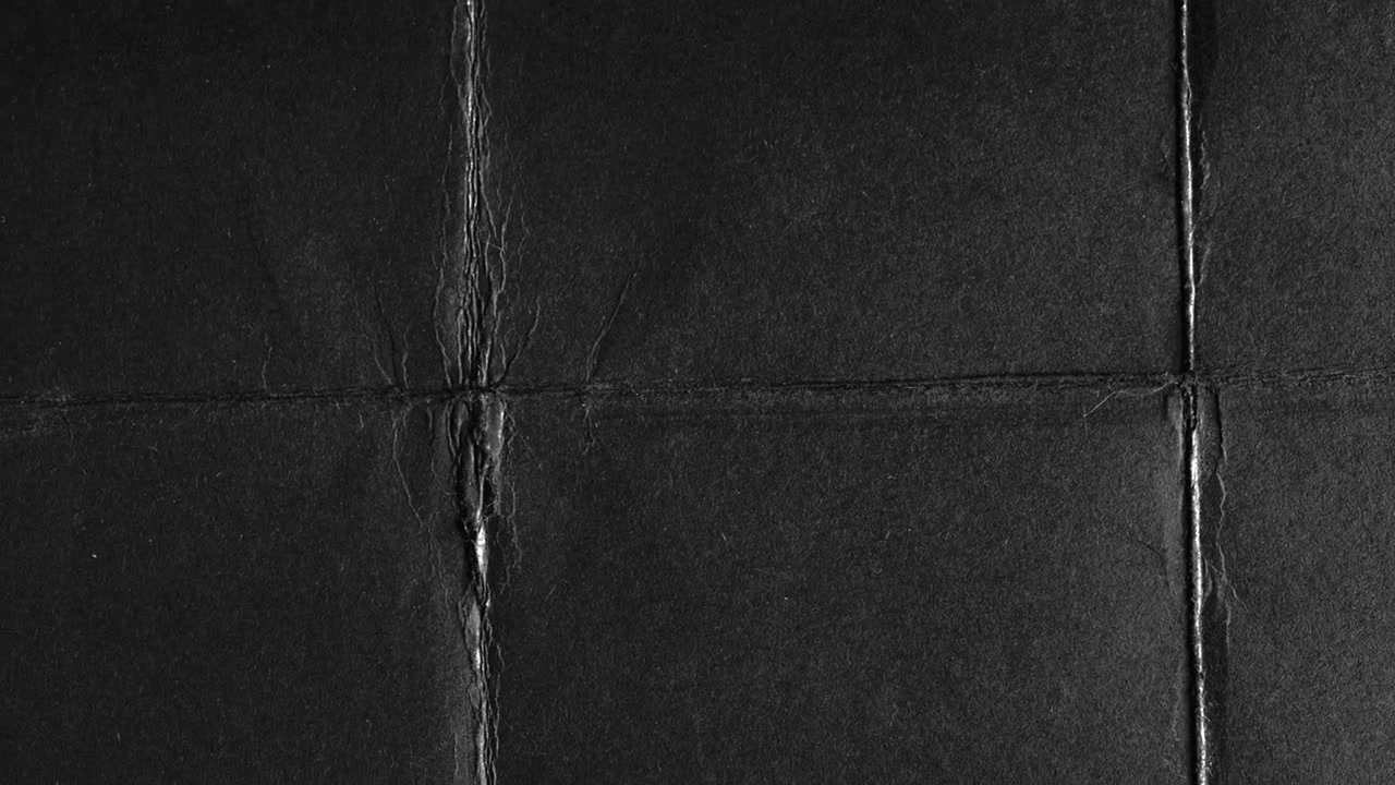 Abstract Black Crumpled and Folded Paper Texture Background