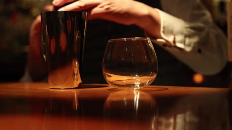 sequence of pouring a beverage into a glass