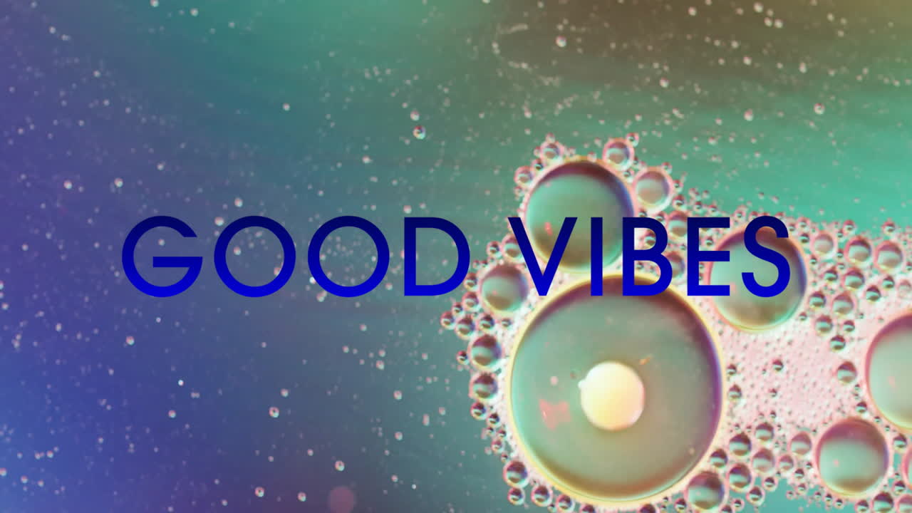 Animation of good vibes text over green bubbles and shapes